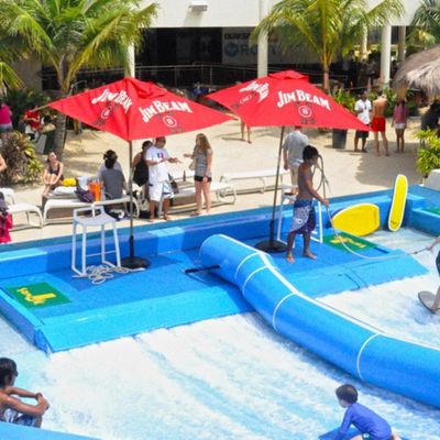 شبیه ساز موج سواری OEM Flowrider با پمپ آب 65kw و PVC نرم و قوی 15.3m * 9.3m